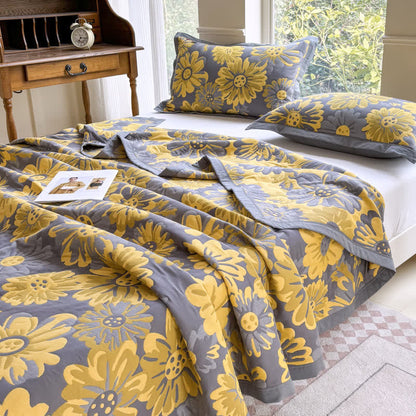 Elegante, leichte Steppdecke aus Baumwollgaze mit Sonnenblumenmotiv