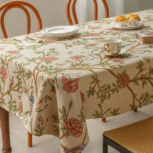Elegante garngefärbte Tischdecke mit Blumen und Vögeln