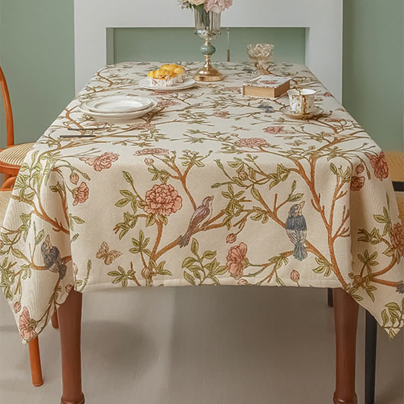 Elegante garngefärbte Tischdecke mit Blumen und Vögeln