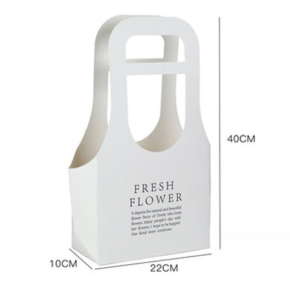 Geschenktüten aus Kraftpapier mit Blumenmotiv und Henkel