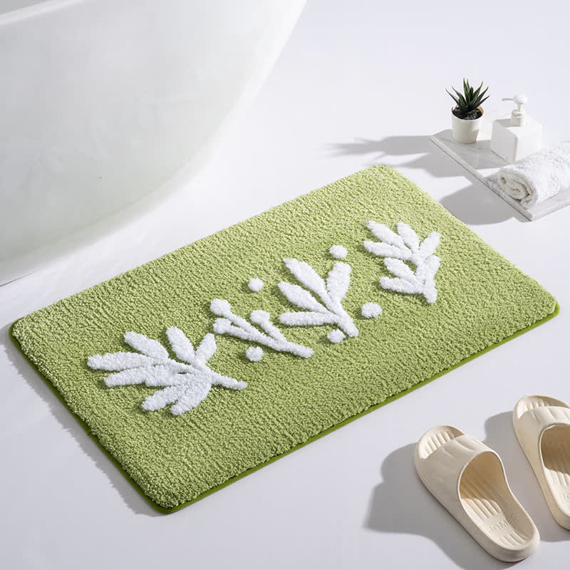 Saugfähige Bodenmatte für das Badezimmer mit Zweigblattpflanze