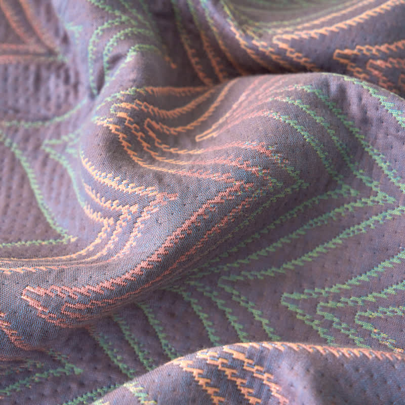 Atmungsaktive Jacquarddecke aus garngefärbter Baumwollgaze