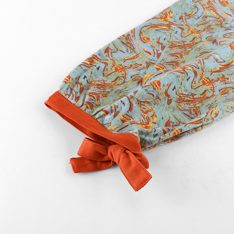 Orange-rotes Loungewear-Set mit langärmeligem Liniendruck