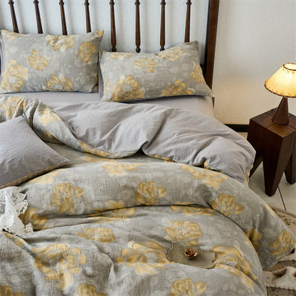 Bettwäscheset aus Baumwollgaze mit neutralem Blumenmuster (4-teilig)