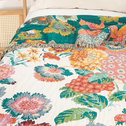 Wendesteppdecke aus mehrlagiger Baumwollgaze mit Blumenmuster und Quasten