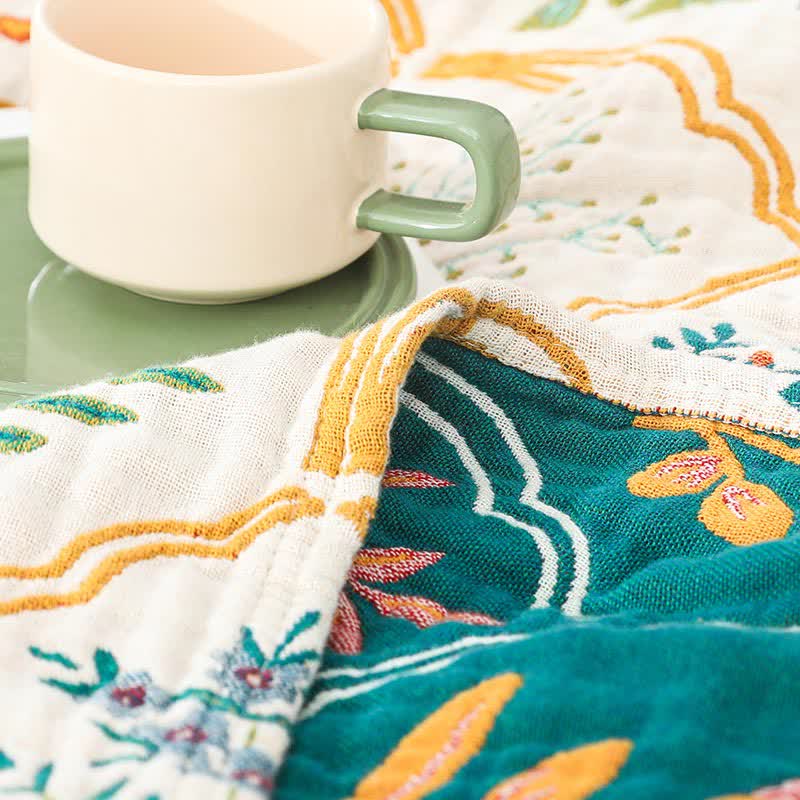 Wendesteppdecke aus Baumwollgaze mit Rautenmuster und Blumenmuster