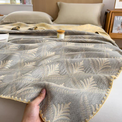 Wendbare Tagesdecke aus Baumwollgaze mit Kiefernzweigen