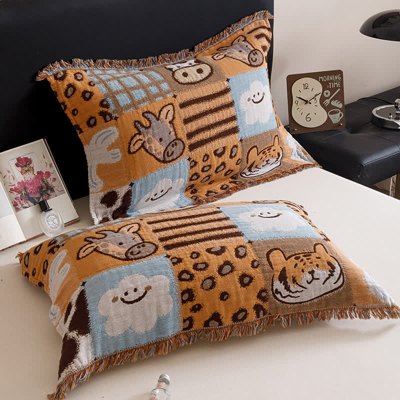 Vierlagige Steppdecke aus Baumwollgaze mit Quasten und Animalprint