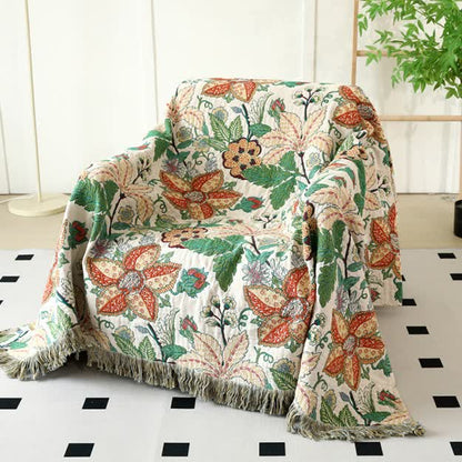 Wendedecke aus Baumwollgaze mit Blumen- und Blattmotiv und Quasten