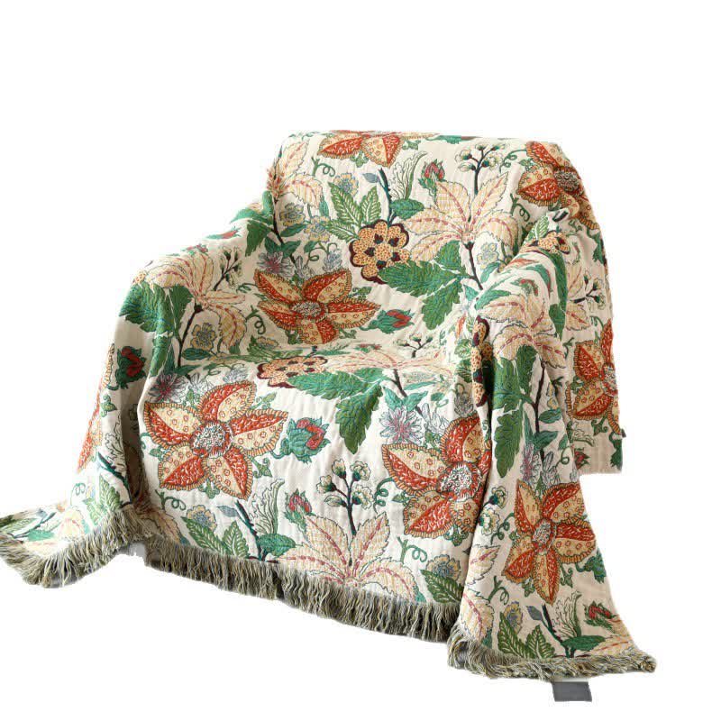 Wendedecke aus Baumwollgaze mit Blumen- und Blattmotiv und Quasten