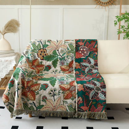 Wendedecke aus Baumwollgaze mit Blumen- und Blattmotiv und Quasten