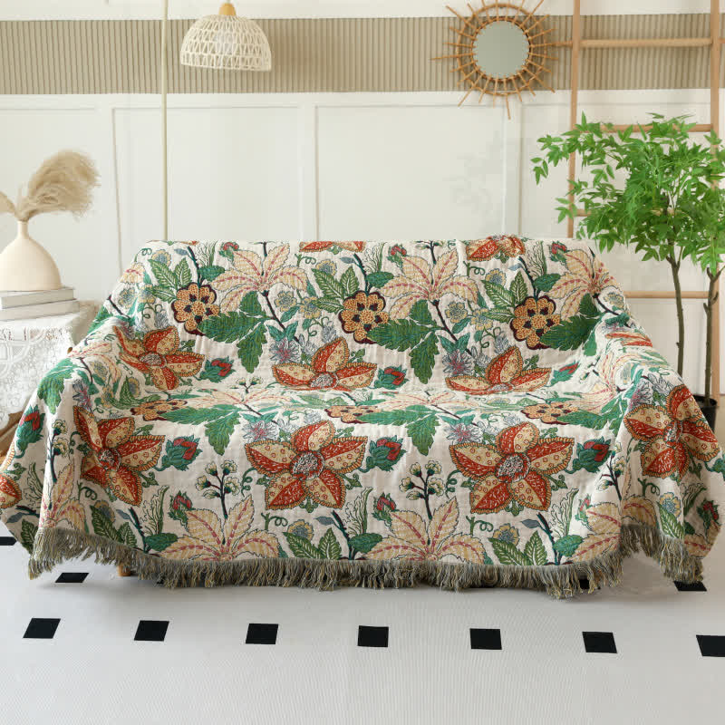 Wendedecke aus Baumwollgaze mit Blumen- und Blattmotiv und Quasten