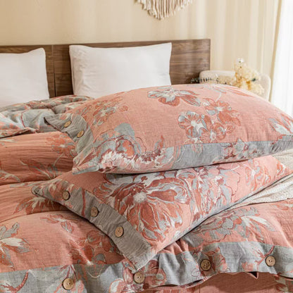 Wendbares Bettwäscheset aus Baumwollgaze mit Blumenmuster und Knöpfen (4-teilig)