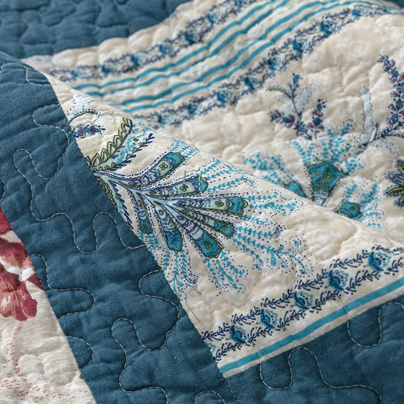 Patchworkdecke aus Baumwolle mit kariertem botanischem Druck
