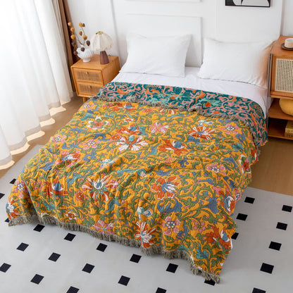 Wendedecke aus Baumwolle mit Vintage-Blumenmuster und Quasten