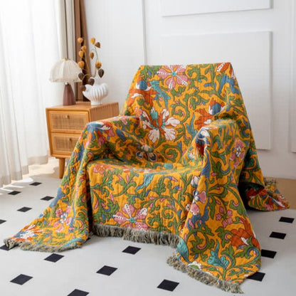 Wendedecke aus Baumwolle mit Vintage-Blumenmuster und Quasten