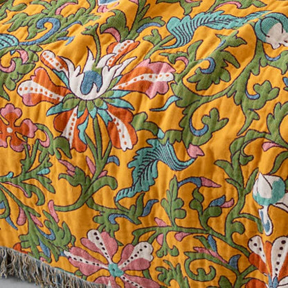 Wendedecke aus Baumwolle mit Vintage-Blumenmuster und Quasten