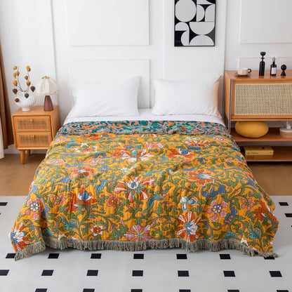 Wendedecke aus Baumwolle mit Vintage-Blumenmuster und Quasten
