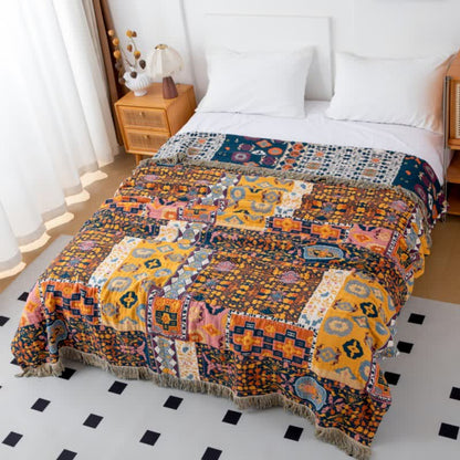 Boho Art Patchwork-Wendedecke aus Baumwolle mit Quasten