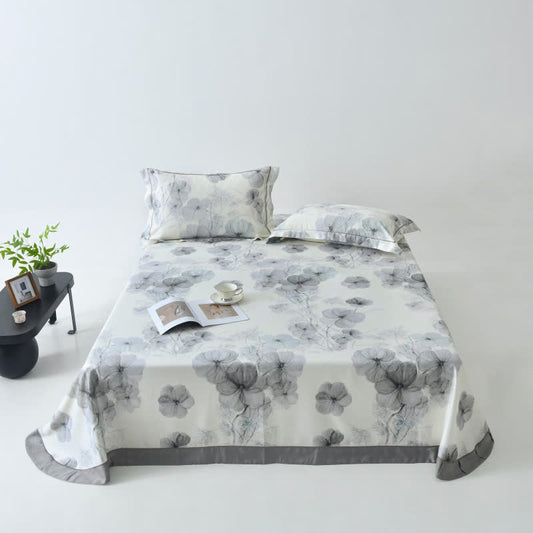 Kühle Tagesdecke aus Naturfaser mit Stiefmütterchen-Print