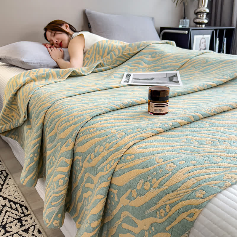 Steppdecke aus Baumwollmusselin mit Zebra-Blumenmuster