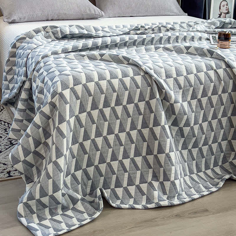 Steppdecke aus Baumwollmusselin mit geometrischem Dreiecksmuster