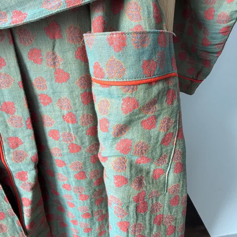 Orangefarbener Kimono aus Baumwolle mit Monstera-Print