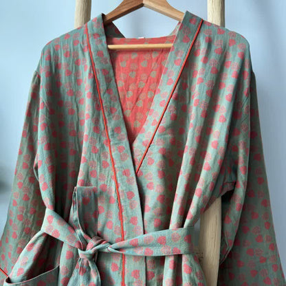 Orangefarbener Kimono aus Baumwolle mit Monstera-Print