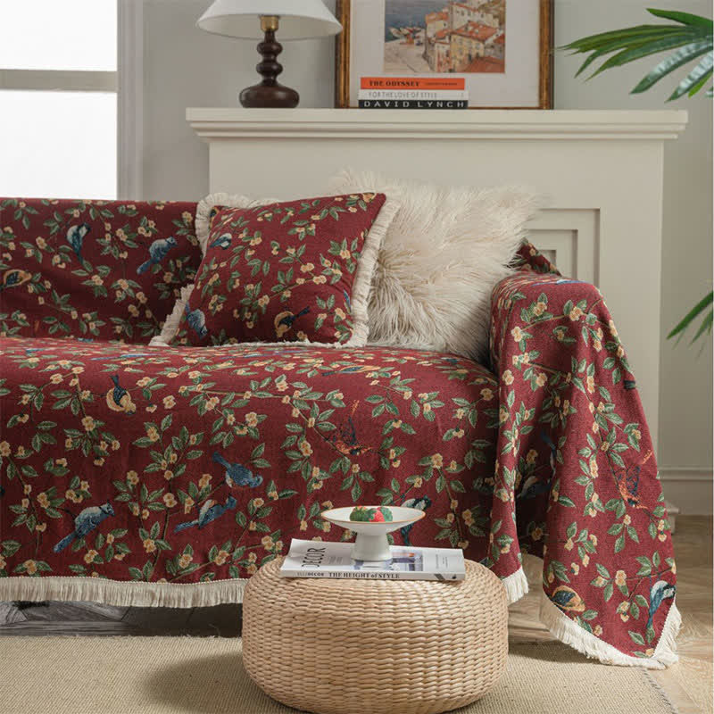 Weicher Sofaschoner mit Quasten und Blumen- und Vogelmotiv
