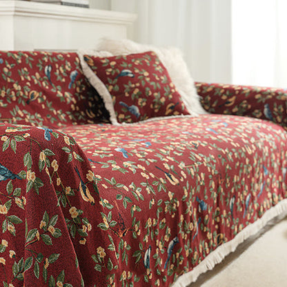 Weicher Sofaschoner mit Quasten und Blumen- und Vogelmotiv