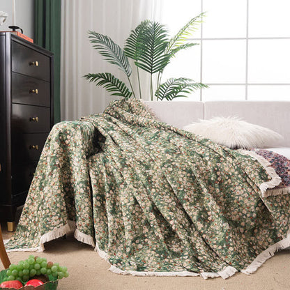 Sofaschoner mit Blumenmuster und Quasten im Landhausstil, Grün