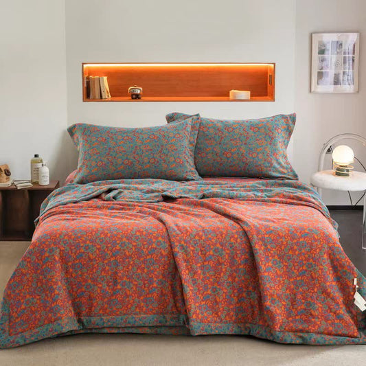 Orangefarbene Jacquard-Steppdecke aus Baumwollgaze mit Blumenmuster