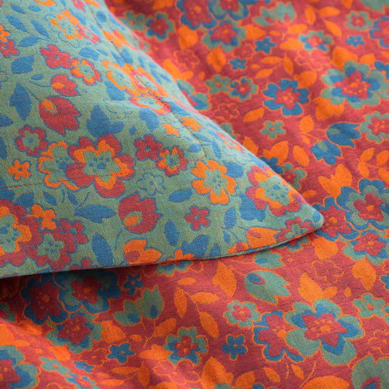 Orangefarbene Jacquard-Steppdecke aus Baumwollgaze mit Blumenmuster