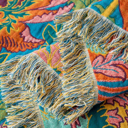 Poppy Decke aus natürlicher Baumwolle mit Quasten