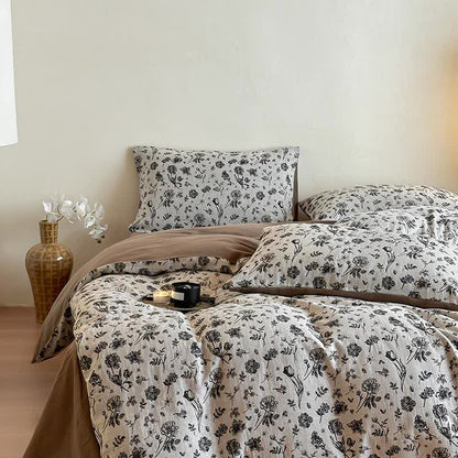 Schwarzes Bettwäscheset aus natürlicher Baumwolle mit Blumenmuster (4-teilig)