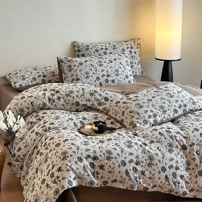Schwarzes Bettwäscheset aus natürlicher Baumwolle mit Blumenmuster (4-teilig)