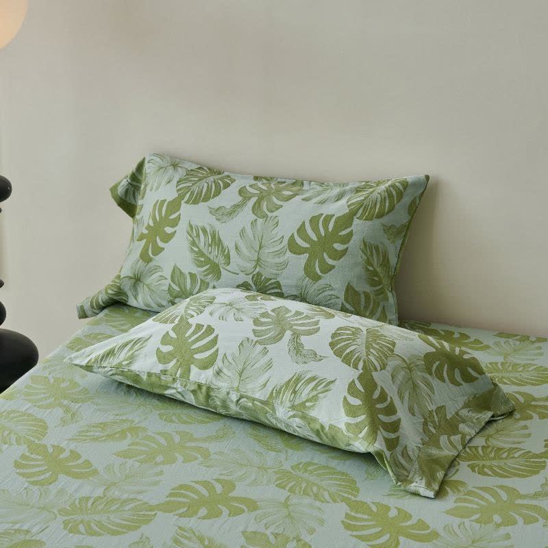 Grüne Tagesdecke aus Baumwollgaze-Jacquard mit Monstera-Motiv - image 3