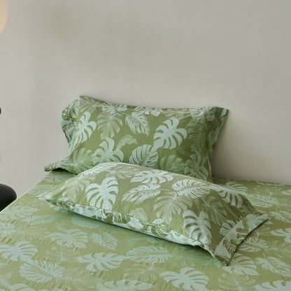Grüne Tagesdecke aus Baumwollgaze-Jacquard mit Monstera-Motiv - image 7