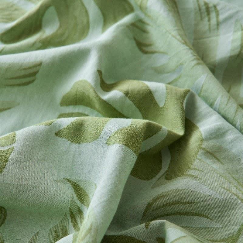 Grüne Tagesdecke aus Baumwollgaze-Jacquard mit Monstera-Motiv - image 4