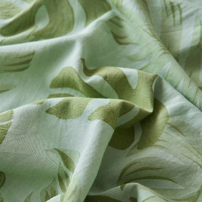 Grüne Tagesdecke aus Baumwollgaze-Jacquard mit Monstera-Motiv - image 4