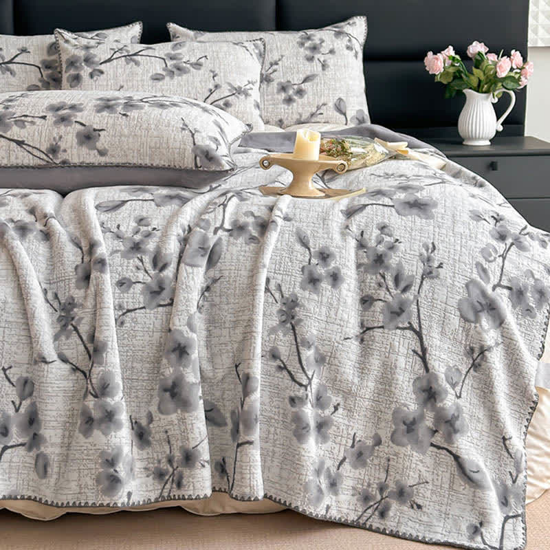 Jacquard-Überwurfdecke mit Pflaumenblütenmuster - image 1