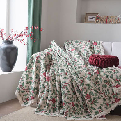 Weihnachtsinspirierte Sofadecke mit Stechpalmenblättern - image 1