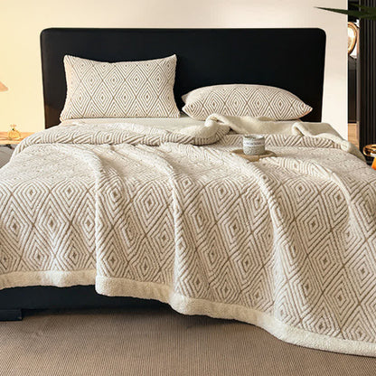 Sherpa-Überwurfdecke mit geometrischem Rautenmuster und Jacquardmuster - image 4