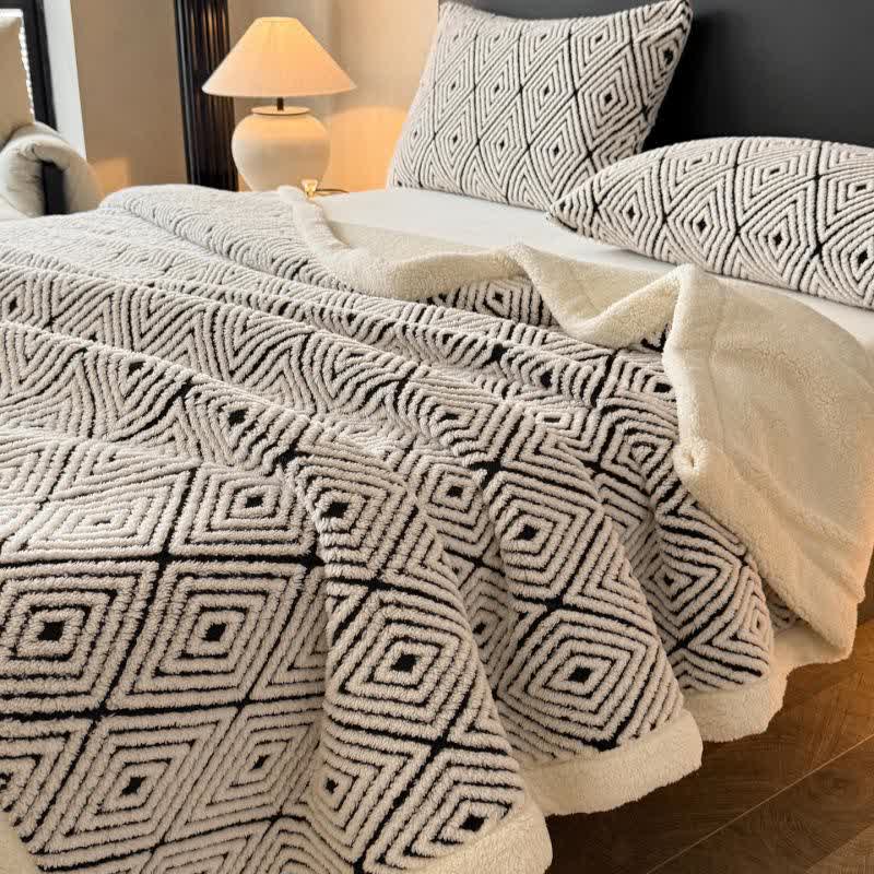 Sherpa-Überwurfdecke mit geometrischem Rautenmuster und Jacquardmuster - image 1