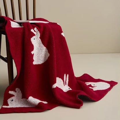 Strickdecke im nordischen Stil mit Kaninchenmotiv - image 3