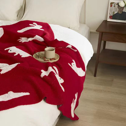 Strickdecke im nordischen Stil mit Kaninchenmotiv - image 4