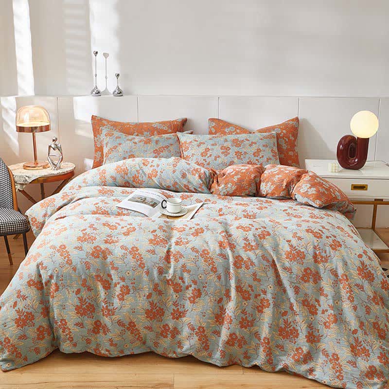 Bettwäsche aus orangefarbenem Baumwoll-Doppelgaze mit Blumenmuster - image 1