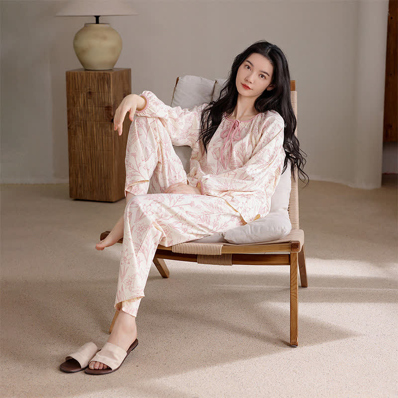 Elegantes Pyjama-Set aus Baumwolle mit Blumenmuster und Rundhalsausschnitt - image 1