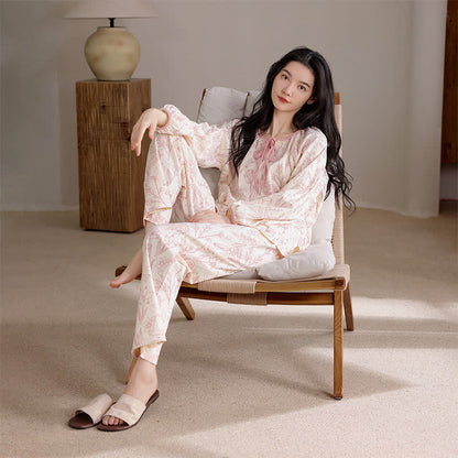 Elegantes Pyjama-Set aus Baumwolle mit Blumenmuster und Rundhalsausschnitt - image 1