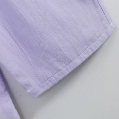 Pyjama-Set aus kariertem Baumwollgaze mit Knopfleiste - image 21